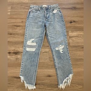 Distressed Blue Jeans